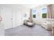 bedroom with neutral color scheme, carpet, closet, and ample natural light at 7058 Cloer Ct, Charlotte, NC 28214
