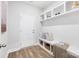Organized mudroom features built-in storage, a bench with storage, and seamless access to the entryway at 7058 Cloer Ct, Charlotte, NC 28214