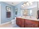 Bright bathroom with double vanity, framed mirror, and modern fixtures at 7355 Drury Ln, Denver, NC 28037