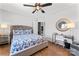 Inviting bedroom with a plush bed, unique decor, and ample natural light at 7355 Drury Ln, Denver, NC 28037
