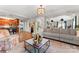 Inviting living space with a grey sectional sofa, open to the kitchen and dining areas at 7355 Drury Ln, Denver, NC 28037