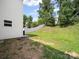 Spacious backyard offering plenty of room for outdoor activities, entertainment and relaxation at 8516 Paw Valley Ln, Charlotte, NC 28214