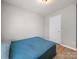 Comfortable bedroom with wood plank floors and ample wall space for decor at 8516 Paw Valley Ln, Charlotte, NC 28214