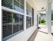 Exterior view of home with white siding, black shutters, and large windows bringing in tons of natural light at 8516 Paw Valley Ln, Charlotte, NC 28214