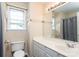 Bathroom featuring a vanity with a large mirror, a toilet, and a shower with a curtain at 9410 Culcairn Rd, Huntersville, NC 28078