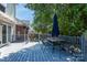 Spacious deck with outdoor seating, overlooking the manicured backyard at 9410 Culcairn Rd, Huntersville, NC 28078