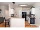 Charming kitchen featuring modern black appliances, countertops and white cabinetry at 9410 Culcairn Rd, Huntersville, NC 28078
