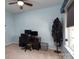 Office with blue walls, neutral carpet, and a view of the window at 9410 Culcairn Rd, Huntersville, NC 28078