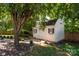 Charming shed in a landscaped backyard, offering extra storage space at 9410 Culcairn Rd, Huntersville, NC 28078