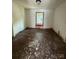 Bedroom featuring original wood floors and windows, awaiting a fresh new design at 1008 Packard Ave, Kannapolis, NC 28083