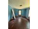 Bedroom featuring original wood floors and windows, awaiting a fresh new design at 1008 Packard Ave, Kannapolis, NC 28083