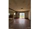 Living room with classic wood floors and a sliding door to the outdoor deck at 1008 Packard Ave, Kannapolis, NC 28083