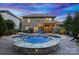 Stunning backyard featuring an inviting pool, lounge area, and pergola-covered outdoor space at 1026 Arges River Dr, Fort Mill, SC 29715