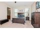 Comfortable bedroom with a wooden bed, a dresser and carpeted flooring at 1026 Arges River Dr, Fort Mill, SC 29715