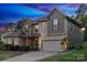 Beautiful two-story home featuring mixed material facade and attached two car garage at 1026 Arges River Dr, Fort Mill, SC 29715