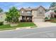 Charming home featuring brick and stone accents, professional landscaping, and an attached two-car garage at 1026 Arges River Dr, Fort Mill, SC 29715