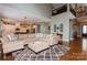 Open concept living space showcasing the kitchen, dining, and living areas with hardwood floors at 1026 Arges River Dr, Fort Mill, SC 29715