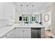 Open concept kitchen view to living area, modern design, and lots of natural light at 106 N Laurel Ave # 118, Charlotte, NC 28207