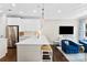 Modern kitchen with stainless steel appliances and counter seating perfect for entertaining at 106 N Laurel Ave # 118, Charlotte, NC 28207