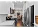 Efficient kitchen with stainless steel appliances and open view to the dining area at 106 N Laurel Ave # 118, Charlotte, NC 28207