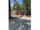 The home's partially fenced backyard provides additional privacy and play space at 11204 Williams Rd, Mint Hill, NC 28227