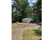 A detached garage featuring ample space for multiple vehicles and storage at 11204 Williams Rd, Mint Hill, NC 28227