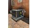 Modern HVAC unit set against a brick exterior wall, providing efficient climate control at 11204 Williams Rd, Mint Hill, NC 28227