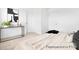 Bright bedroom with a neutral color scheme, carpeted floors, console table and decor at 11712 Avocet St # 76, Charlotte, NC 28215