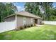 A well-maintained backyard features green grass, vinyl fencing, and neutral siding at 1189 Quiet Acres Rd, Rock Hill, SC 29732