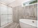 Bathroom with tub, tile shower, and decorative tile at 1189 Quiet Acres Rd, Rock Hill, SC 29732