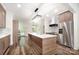 Stylish kitchen with a central island, stainless steel appliances, ample counter space, and modern lighting at 1189 Quiet Acres Rd, Rock Hill, SC 29732
