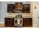 Contemporary kitchen boasts stainless steel appliances, including a stove, microwave, and dark cabinets at 134 Cherry Bark Dr, Mooresville, NC 28117