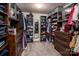 Spacious walk-in closet with custom shelving and ample storage for clothes and accessories at 134 Cherry Bark Dr, Mooresville, NC 28117
