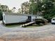 Exterior features include a white house with a ramp for wheelchair access at 1341 Pleasant Hill Church Rd, Wadesboro, NC 28170
