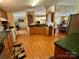 Well-equipped kitchen with sleek green countertops, plenty of cabinets, and modern appliances at 1341 Pleasant Hill Church Rd, Wadesboro, NC 28170