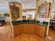Open kitchen with cabinets and countertops overlooking the living space at 1341 Pleasant Hill Church Rd, Wadesboro, NC 28170