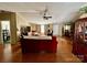Spacious living room with a fireplace and access to the dining room at 1341 Pleasant Hill Church Rd, Wadesboro, NC 28170