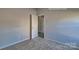 Comfortable bedroom with neutral carpet and convenient ensuite access at 159 Apple Orchard Ct, Statesville, NC 28677