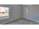 Cozy bedroom featuring plush carpeting and a bright window at 159 Apple Orchard Ct, Statesville, NC 28677