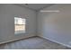 Well-lit bedroom featuring carpet and a pleasant view from the window at 159 Apple Orchard Ct, Statesville, NC 28677