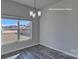 Charming dining area featuring luxury vinyl plank flooring at 159 Apple Orchard Ct, Statesville, NC 28677
