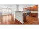 Spacious kitchen featuring stainless steel appliances, dark cabinetry, and an open layout into the living area at 159 E Warfield Dr, Mooresville, NC 28115