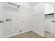 Laundry room with tile floor and wire shelving at 159 E Warfield Dr, Mooresville, NC 28115