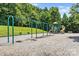 A well maintained playground featuring swingsets, slides, and picnic tables perfect for community enjoyment at 159 E Warfield Dr, Mooresville, NC 28115