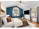 Bright bedroom with vaulted ceilings, a large window, and a calm atmosphere at 160 Walking Horse Run, Stanley, NC 28164