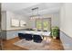 Dining room with a modern table set, artwork, and natural light at 160 Walking Horse Run, Stanley, NC 28164