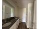 Bathroom with double vanity, granite counters and modern finishes at 1727 E Cloaninger Ave, Statesville, NC 28625