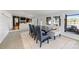 Cozy dining area with views of the lake and comfortable seating, perfect for entertaining at 208 Island View Rd, Mount Holly, NC 28120