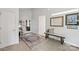 Bright entryway features neutral walls, tile floors, a decorative rug, a bench seat, and a statement mirror at 208 Island View Rd, Mount Holly, NC 28120