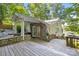 Inviting entrance showcasing the home's unique architecture and lakeside access at 208 Island View Rd, Mount Holly, NC 28120